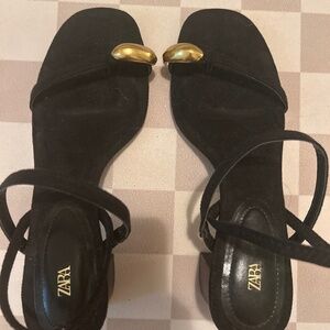 Black heeled sandles with gold detail